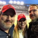 Clint, Ingrid and Jay enjoying a Nats game despite the rain.