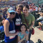 Marie Browne of Reed Exhibitions and Kimberly pose with some adoring and adorable fans after running the Brooklyn Half Marathon!