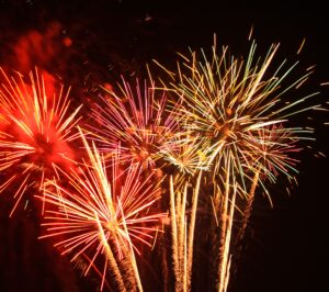 Fireworks before black background.