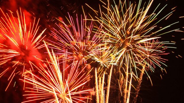 Fireworks before black background.